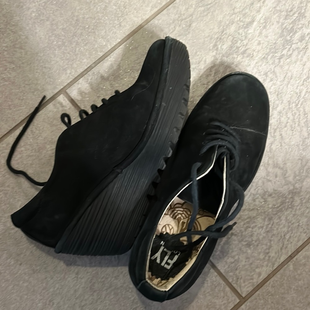 Fly London lace up Oxfords, light wear, would disappear with a good clean.